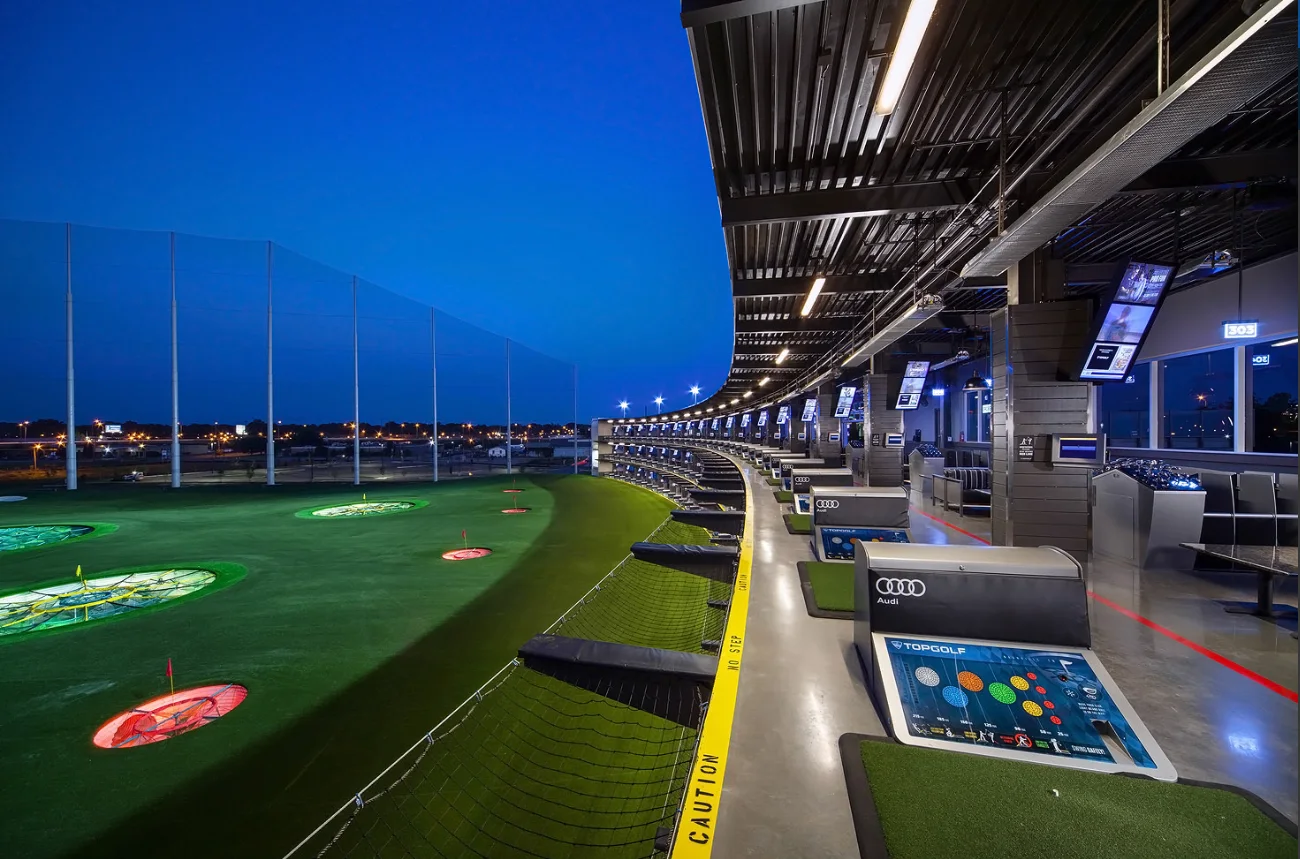 Topgolf Nashville driving bays at dusk, an SRP heating application